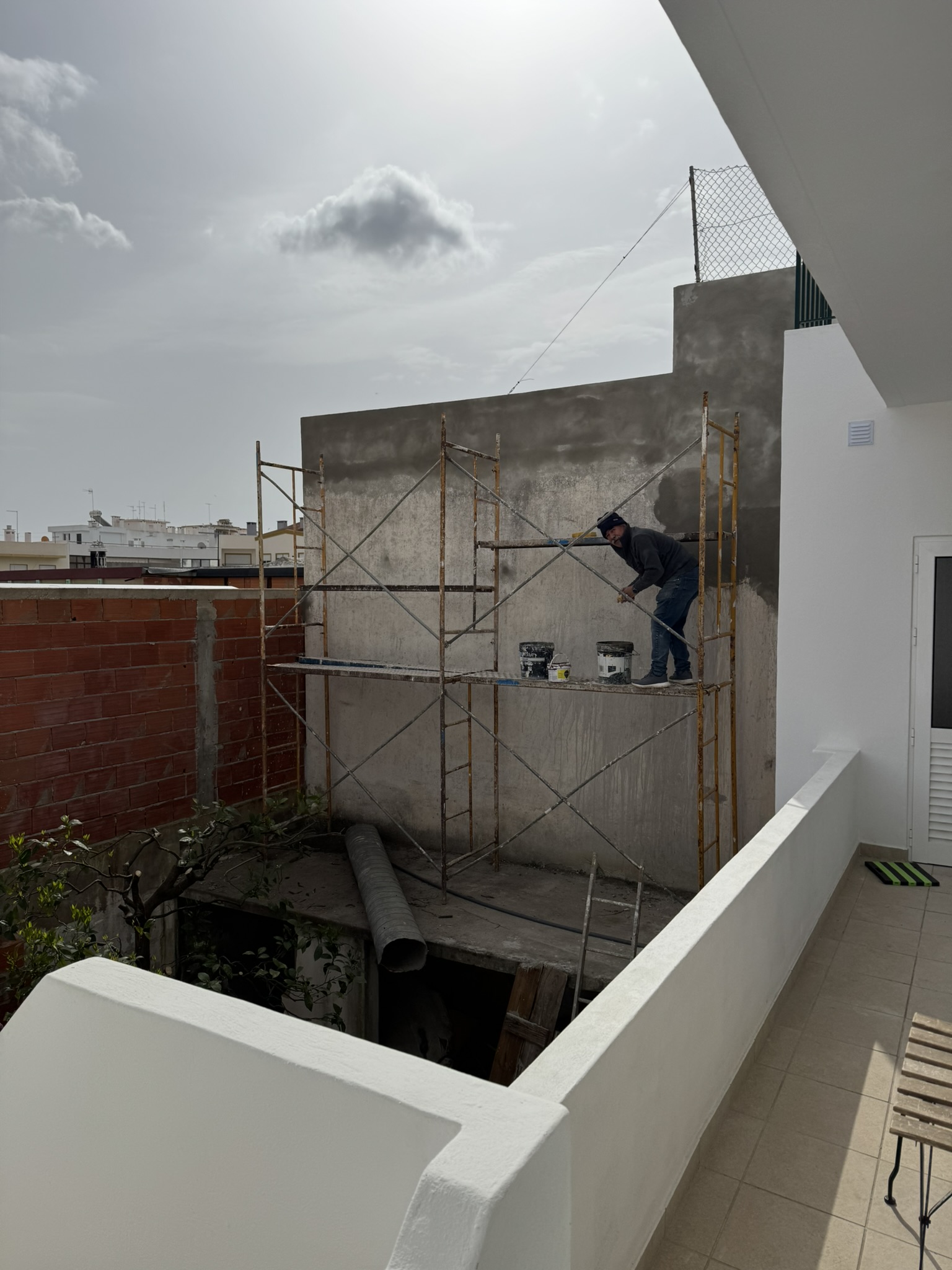Plaster up the south wall