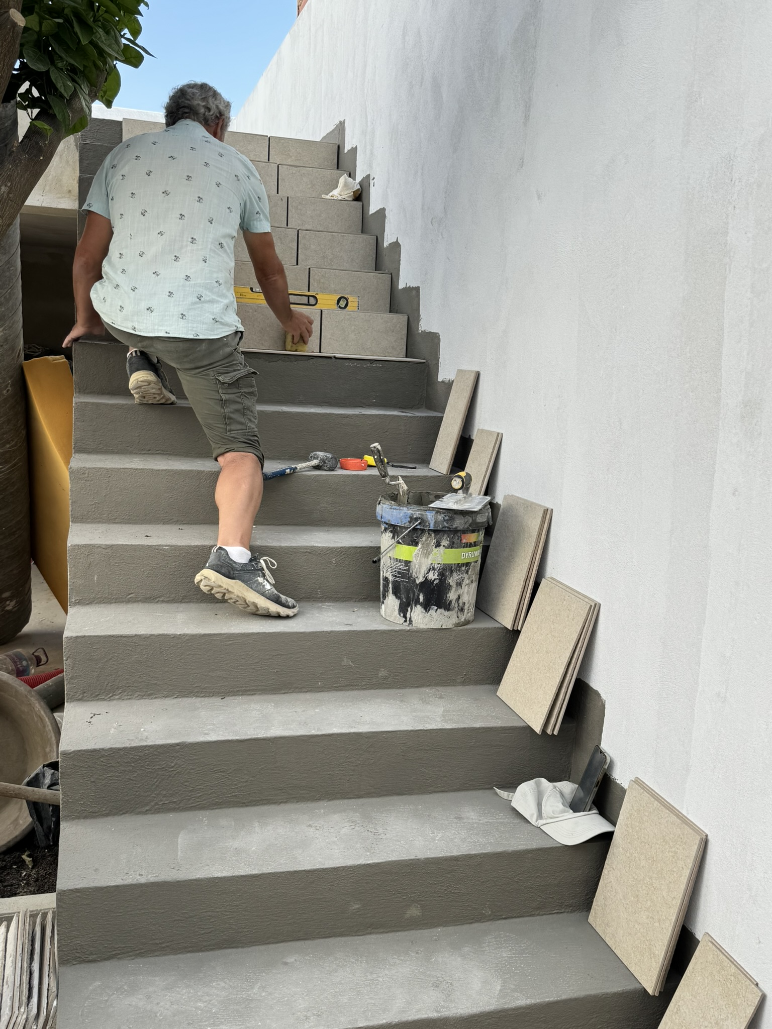 Tiles going on stairs