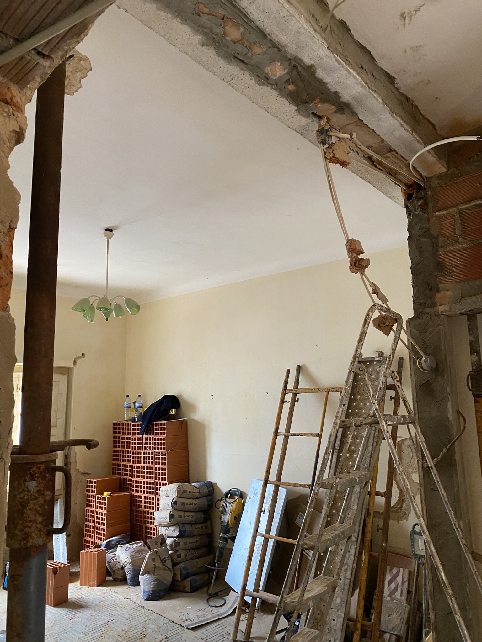 New concrete support beam above the old hallway/living room divider