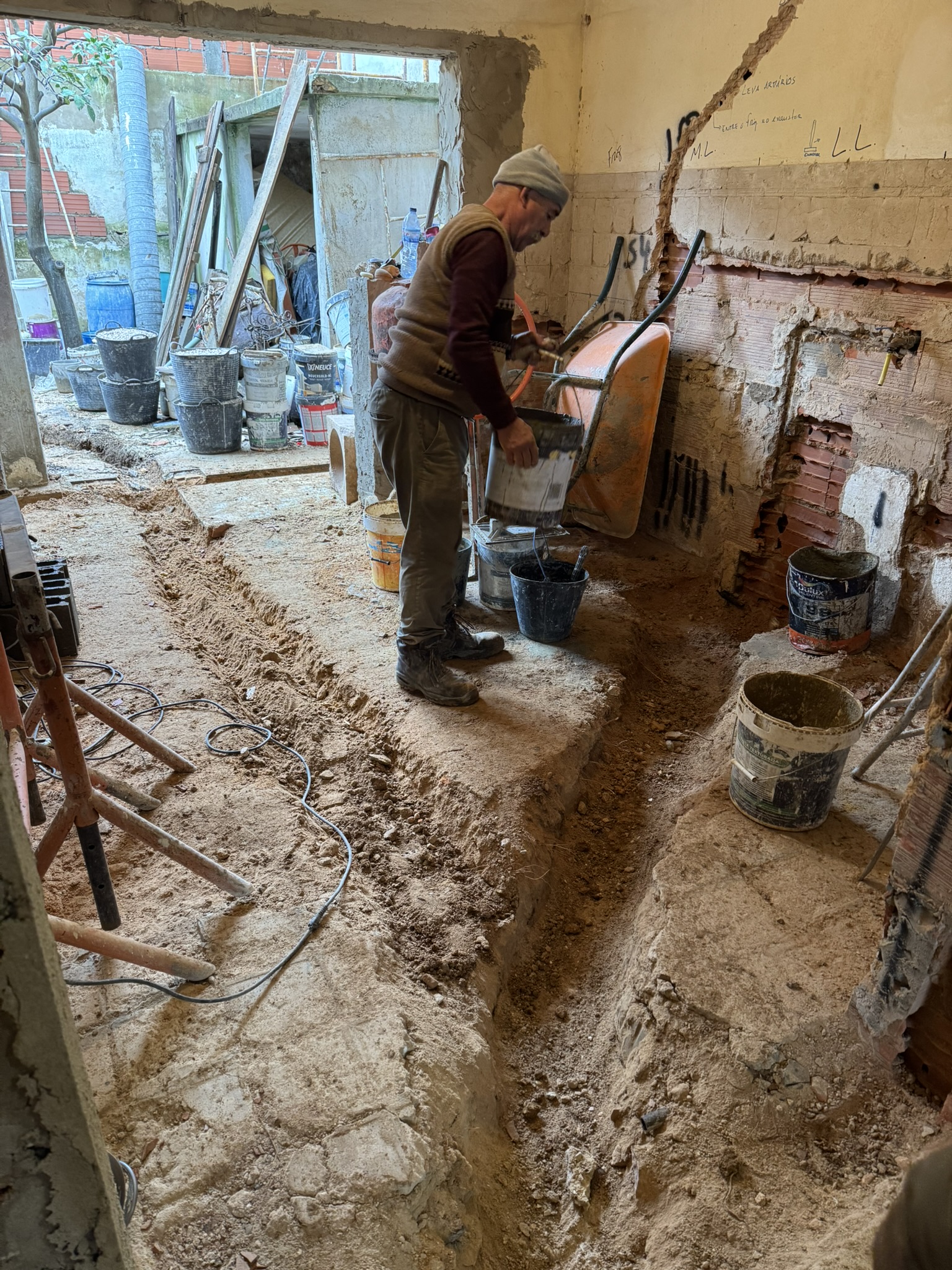 Kitchen with digs for ac and plumbing