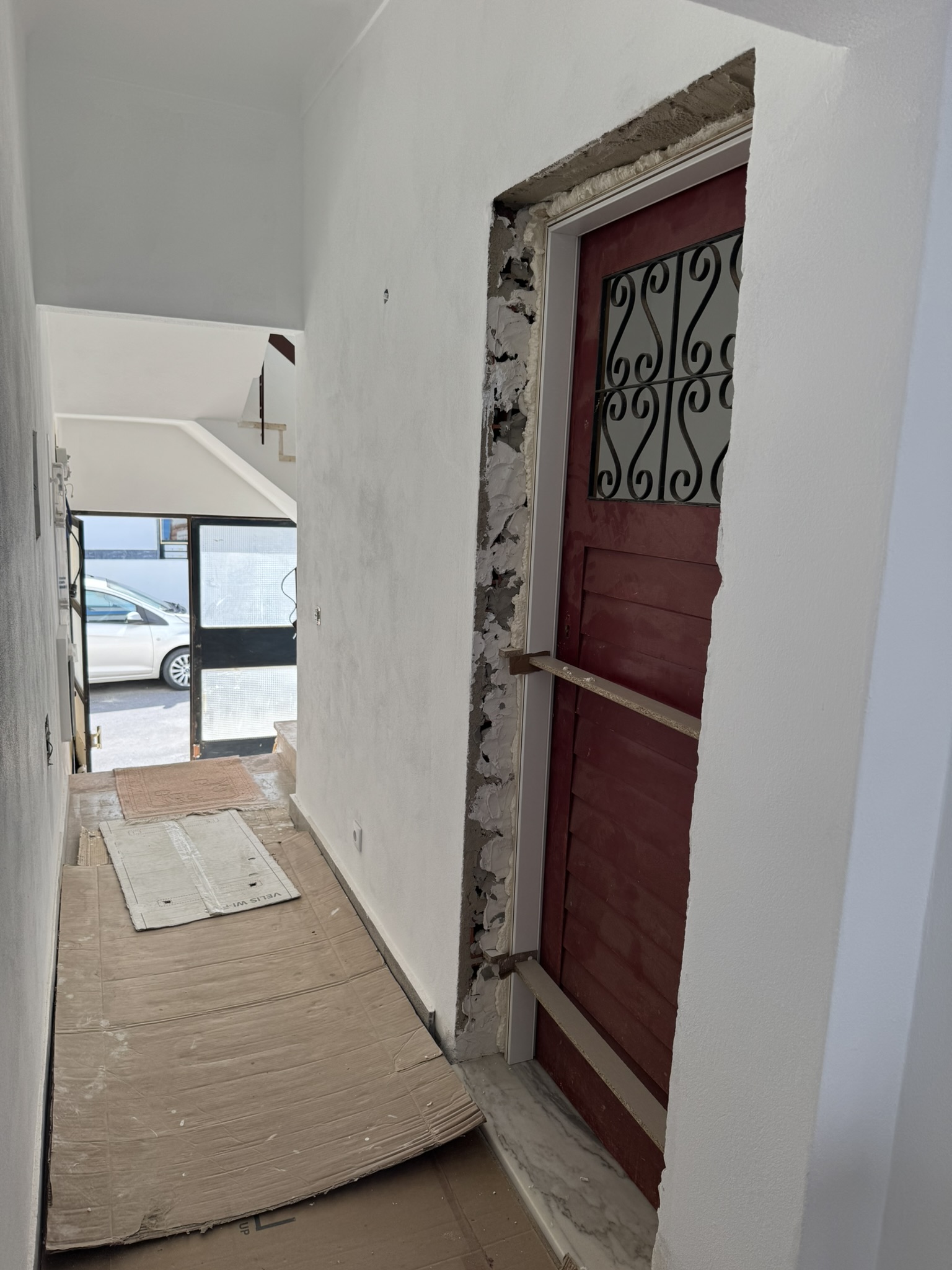 Original apartment frontdoor with new frame